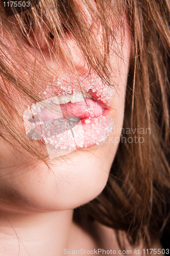 Image of Beautiful girl with sugar on her lips