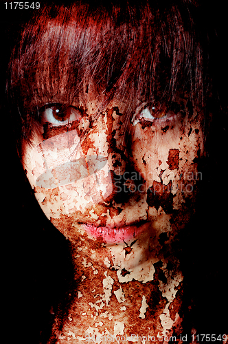 Image of Dark art portrait of a girl with cracks and old paint