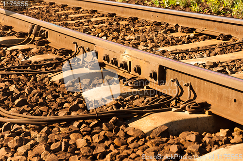 Image of rusty old railway with cables