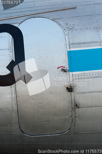 Image of Closeup of an old airplane door