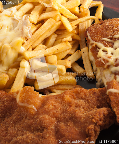 Image of Cordon bleu with fries and cheese