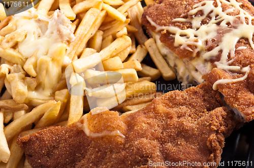 Image of Cordon bleu with fries and cheese