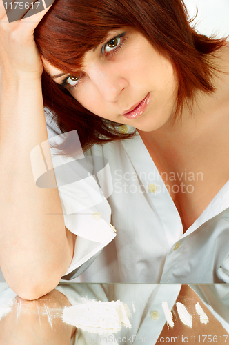 Image of Young woman  in white shirt