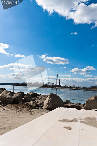 Image of Shore of a river with focus on factory