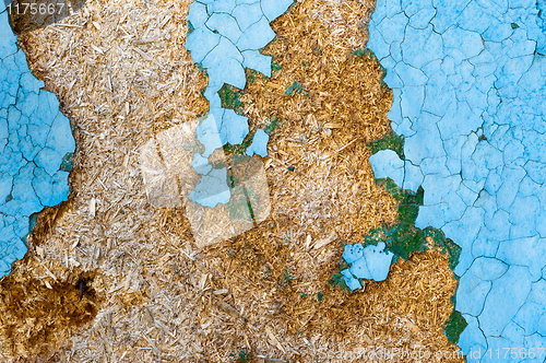 Image of An abandoned wooden background with some blue paint