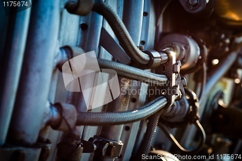 Image of Vintage jet engine part with hoses