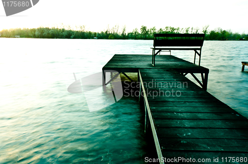 Image of A pier on the shore in cold color