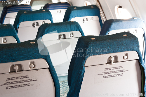 Image of Old seats of an annuated airplane