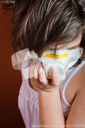 Image of Girl wearing protective mask against flu or radiation