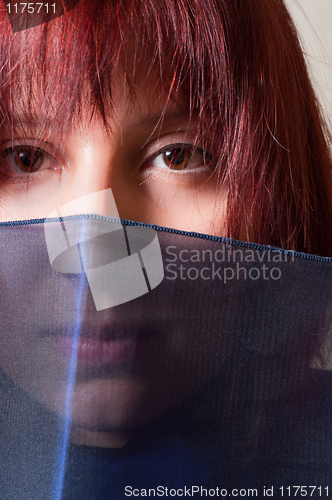 Image of Beautiful young girl in scarf