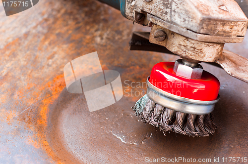 Image of wire brush for cleaning rust off metal surface