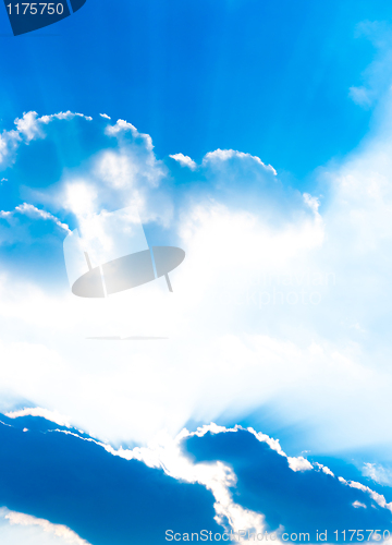 Image of Sun shinging behind clouds