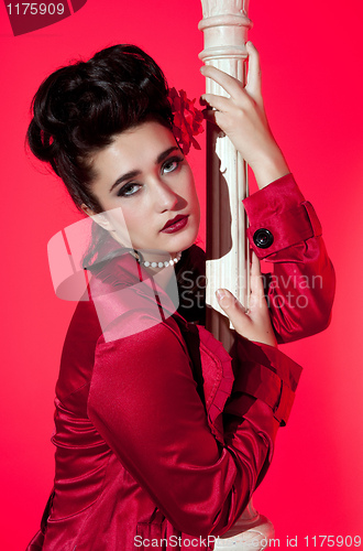 Image of young woman and lightpole