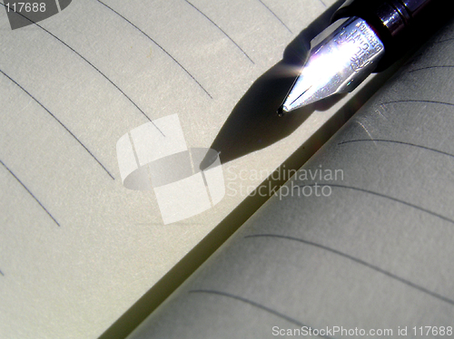 Image of Note book and pen