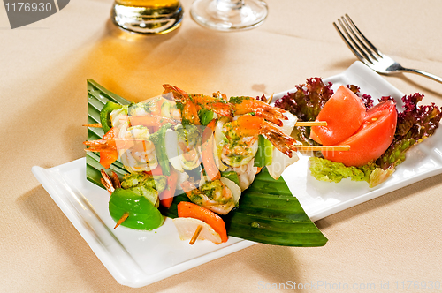 Image of shrimps and vegetables skewers