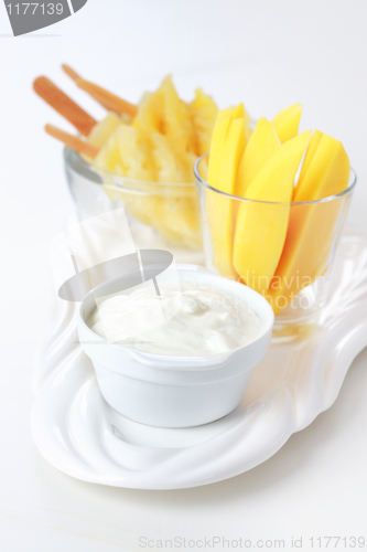 Image of Fresh mango and pineapple and curd cheese