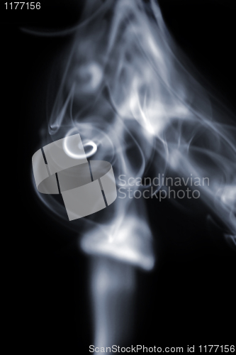 Image of white smoke on black