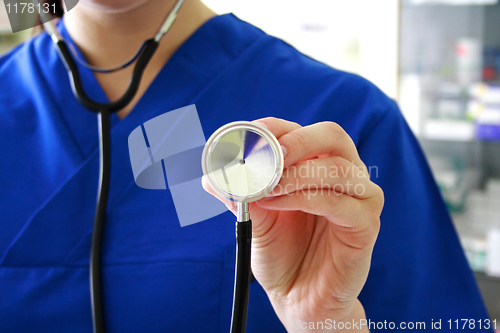 Image of Female doctor holding stethoscope