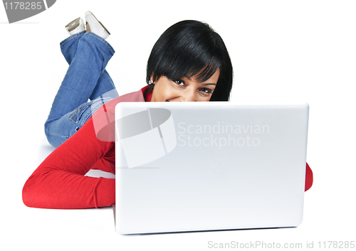 Image of Young woman with laptop computer
