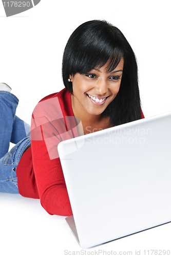 Image of Young woman using laptop computer