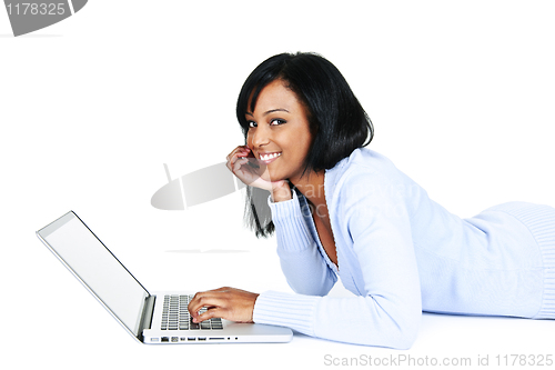 Image of Pretty young woman with computer
