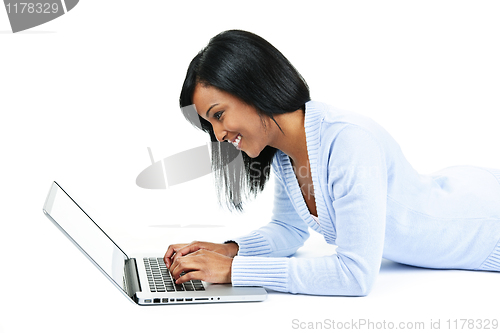 Image of Young woman using laptop computer