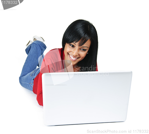 Image of Young woman using laptop computer