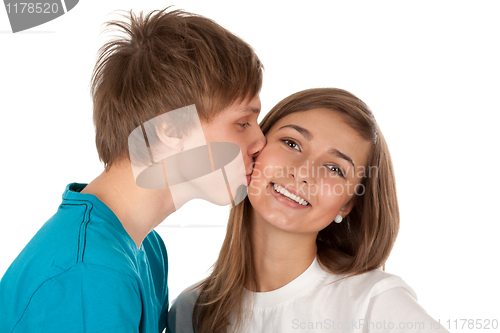 Image of Boy kisses girl