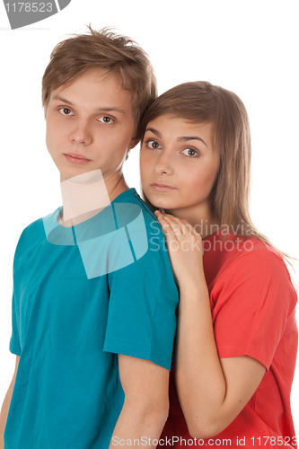 Image of couple of teenagers in color clothes