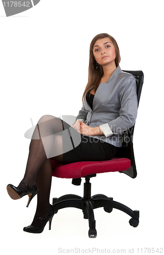 Image of Business woman sitting in a chair