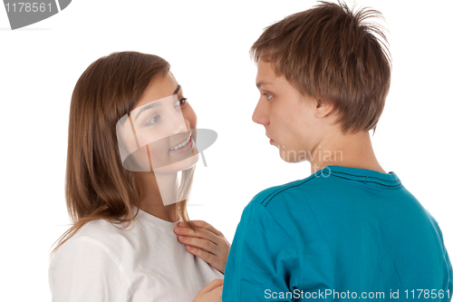Image of pair of teenagers looking at each other