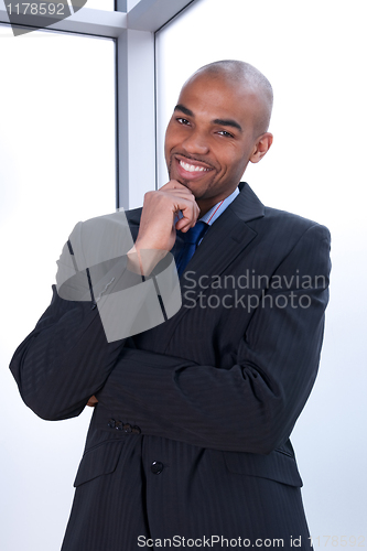 Image of Smiling charismatic businessman