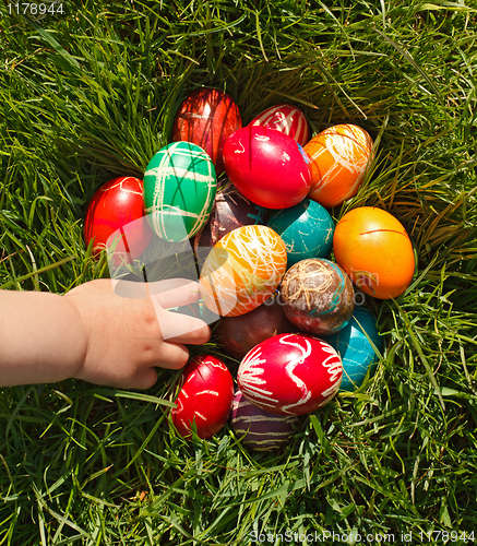 Image of Hand taking Easter egg