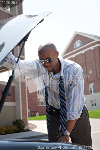 Image of Man with a Broken Down Car