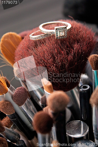 Image of Wedding Rings On Makeup Brushes