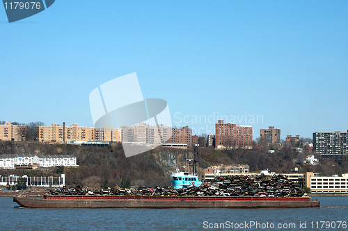 Image of Barge Carrying Recycled Cars and Scrap Metal