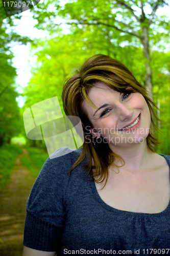 Image of Woman Outside On a Wooded Path