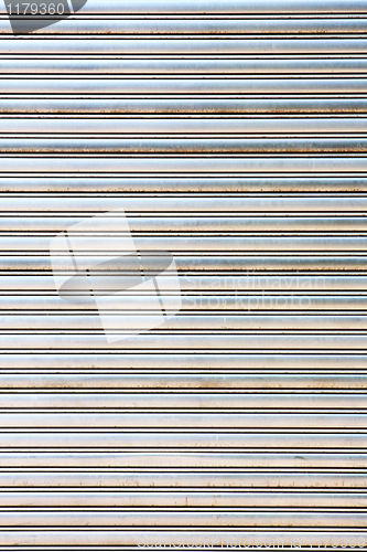 Image of worn metal garage door gate store roller shutter 