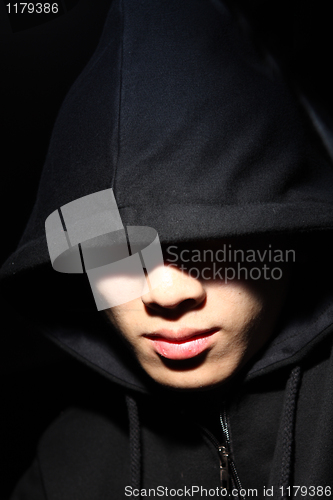 Image of Monochrome picture of a guy in a hood 