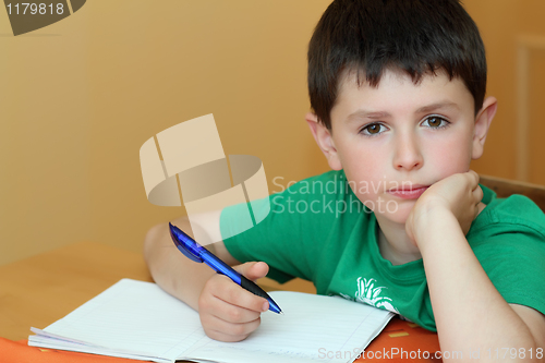 Image of boy doing homework