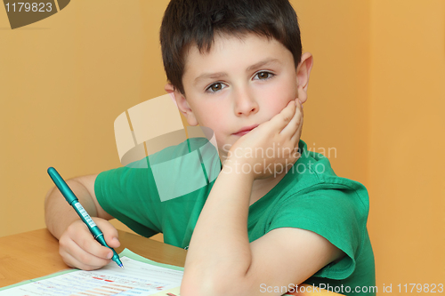 Image of boy doing homework