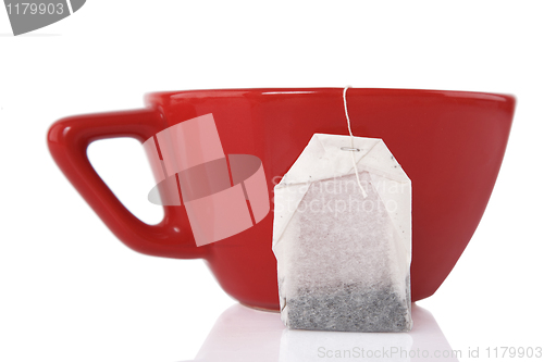 Image of Red Ceramic cup with tea bag 