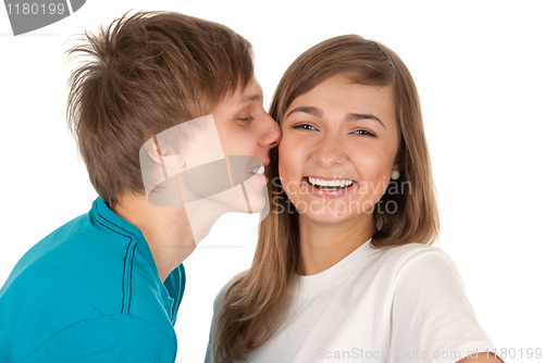Image of boy kisses a girl
