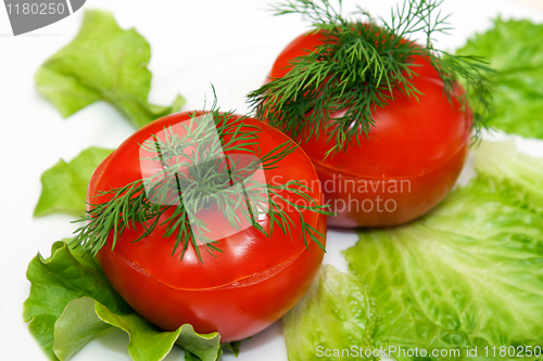 Image of two stuffed tomatoes