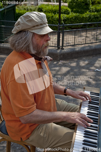 Image of Senior street musician