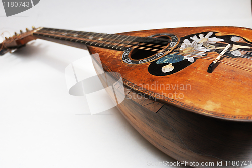 Image of old mandolin with pearl incrustation