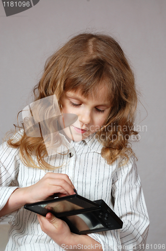 Image of child playing video game 