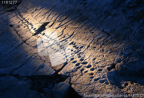 Image of Old rock drawings.