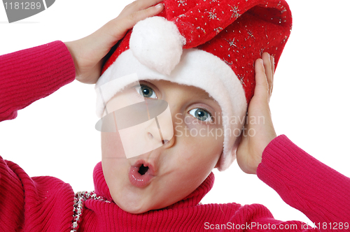 Image of cute surprised Santa girl