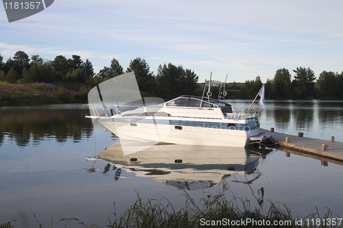 Image of White boat on the dock